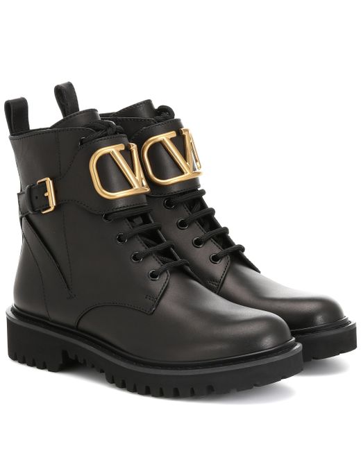 Valentino Garavani Valentino Garavani 'vlogo' Buckle Leather Combat Boots  in Nero (Black) - Save 39% - Lyst