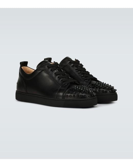 Sneakers Louis Junior Spikes di Christian Louboutin in Black da Uomo