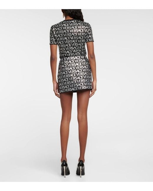 Versace Black Logo Embellished Miniskirt