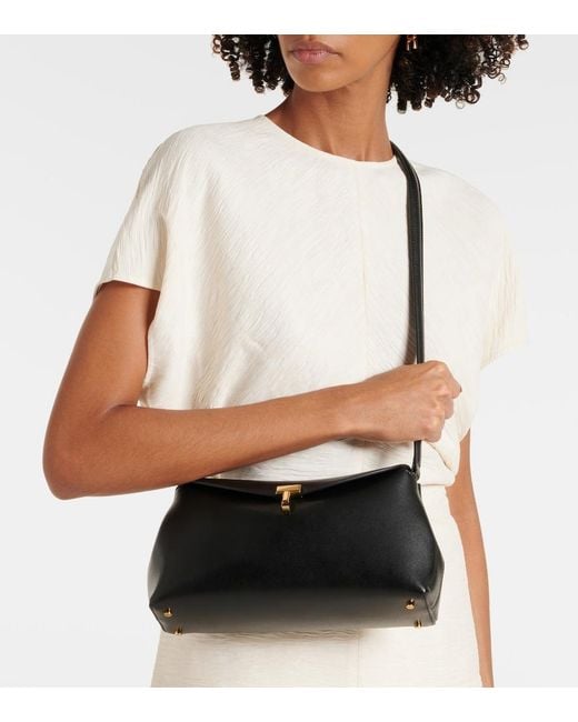 Totême Black T-Lock Small Leather Clutch