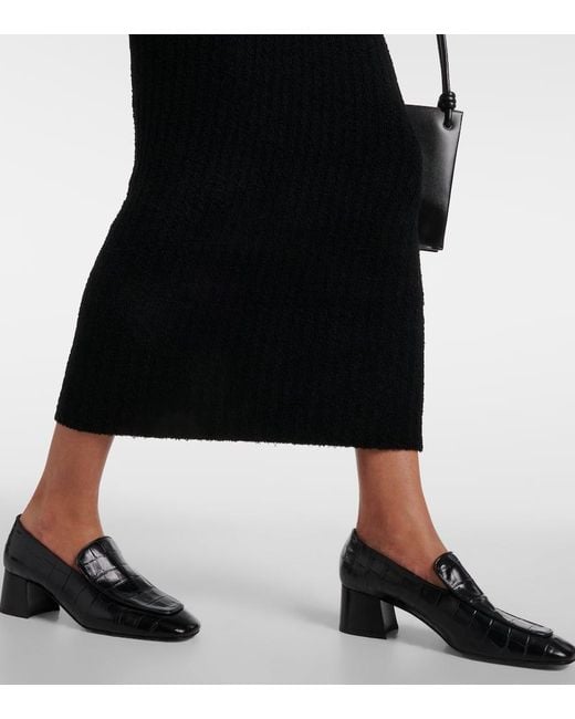Robe longue noire à col en v Totême  en coloris Black