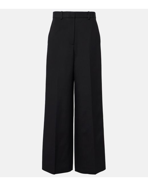 Pantalon ample Bacall a taille basse Khaite en coloris Black