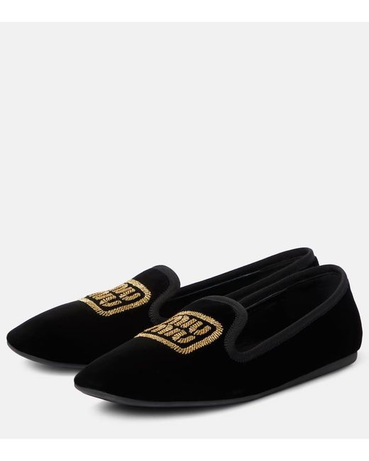 Slippers con logo bordado Miu Miu de color Black