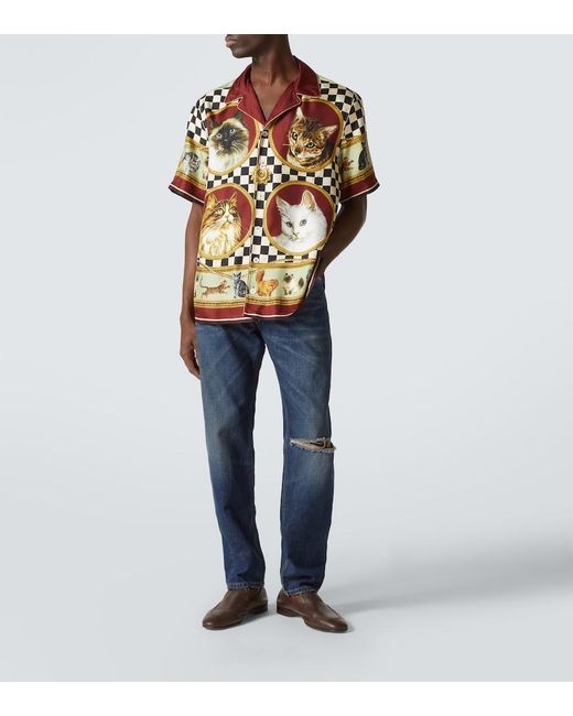 Dolce & Gabbana Blue Distressed Slim Jeans for men