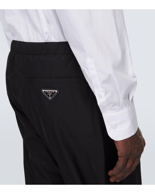 Pantalon de survetement en soie melangee Prada pour homme en coloris Black