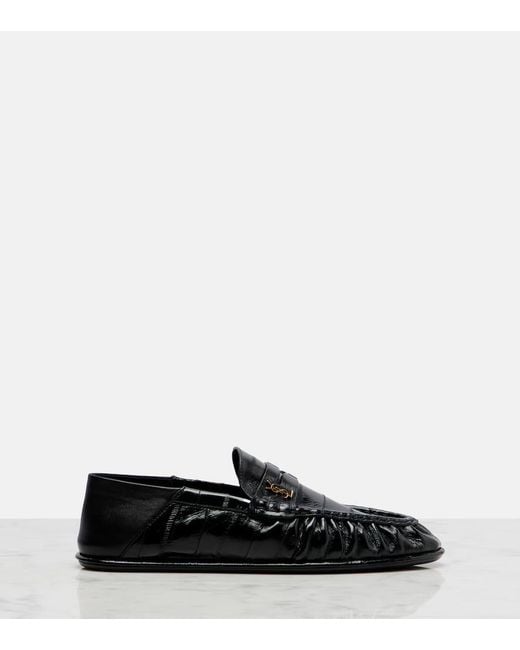 Mocassins En Cuir Verni Saint Laurent en coloris Black