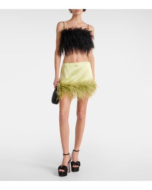Minifalda De Saten Con Plumas Miu Miu de color Yellow