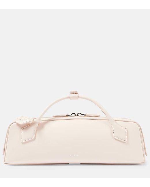 Clutch Le Teckel di Alaïa in Natural