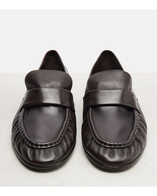 The Row Black Soft Leather Penny Loafers