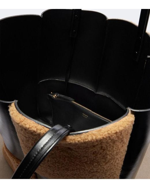 Khaite Black Zoe Medium Shearling Paneled Tote Bag