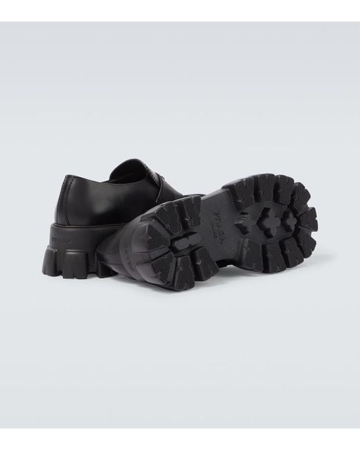 Prada Black Logo Leather Platform Loafers for men