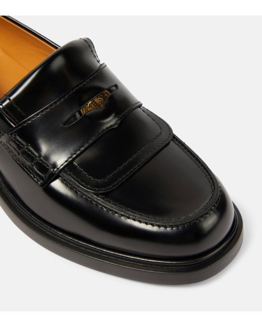 Tod's Black Leather Penny Loafers