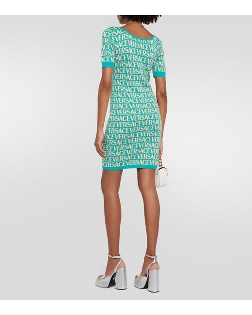 Monogramm Strick -Mini -Kleid Versace de color Green