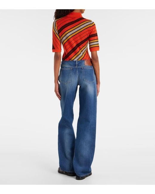 Jeans A Gamba Larga E Vita Bassa di Acne in Blue