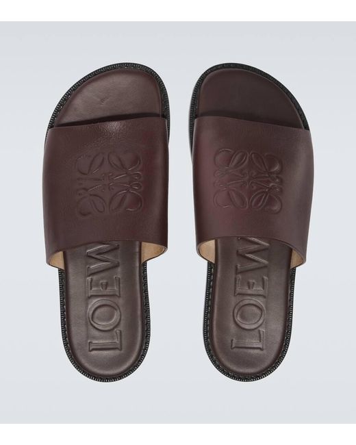 【LOEWE】Paula's Ibiza Flex Anagram leather slides Paula's Ibiza Flex Anagram leather slides in black - Loewe