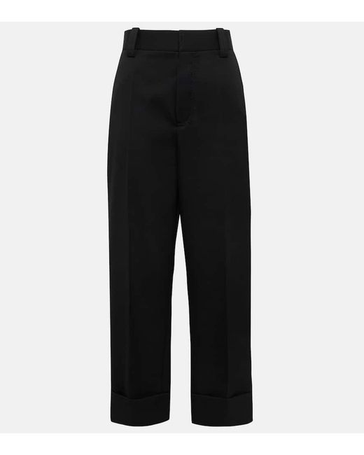 Pantalones anchos cropped de lana de tiro medio Bottega Veneta de color Black