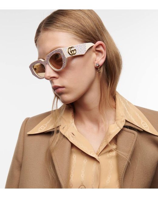 Gucci Natural Ovale Sonnenbrille mit Kristallen