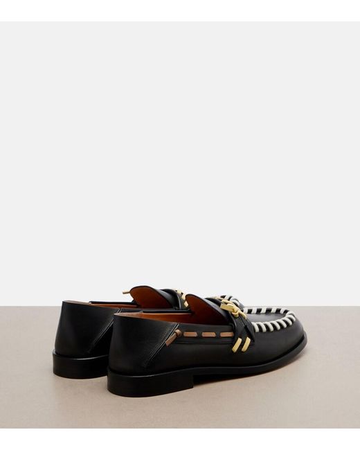 Tod's Black Leather Loafers