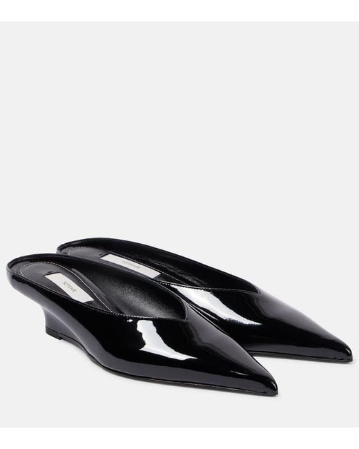 Mules Sharp di Totême  in Black