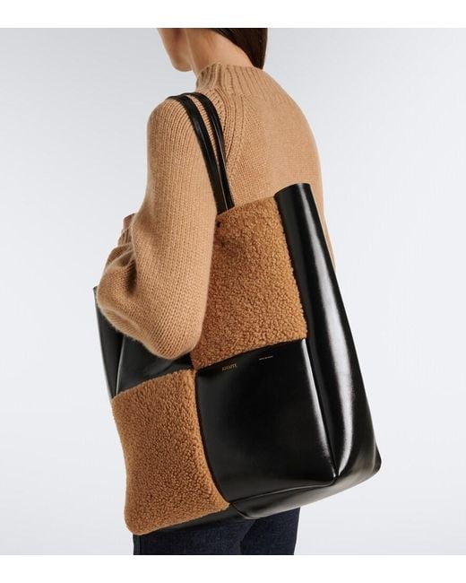 Khaite Black Zoe Medium Shearling Paneled Tote Bag