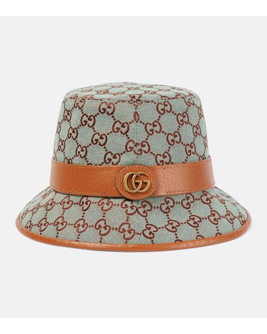 Sombrero de pescador de lona GG con piel Gucci de color Gray