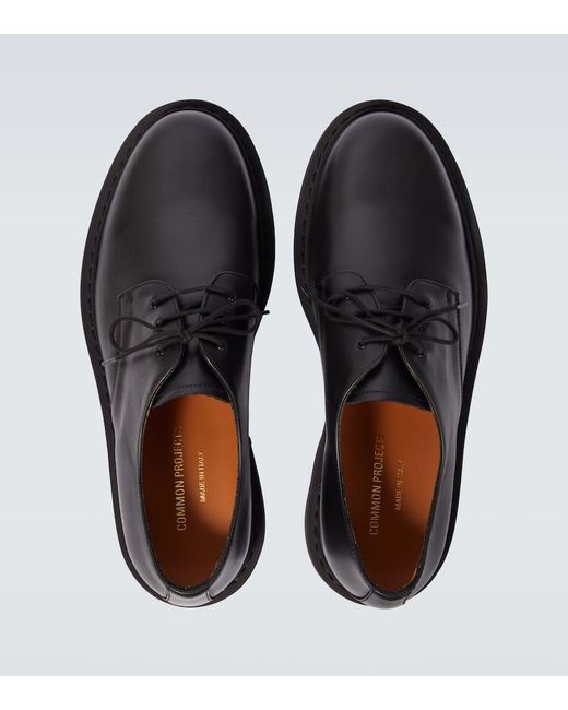 Zapatos derby de piel Common Projects de hombre de color Black