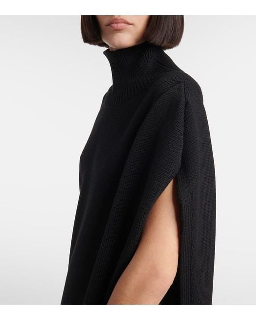 Alaïa Black Turtleneck Asymmetric Cape Hybrid Wool Sweater