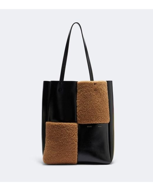 Khaite Black Zoe Medium Shearling Paneled Tote Bag