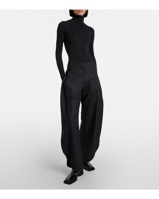 Alaïa Black Leather Slingback Flats