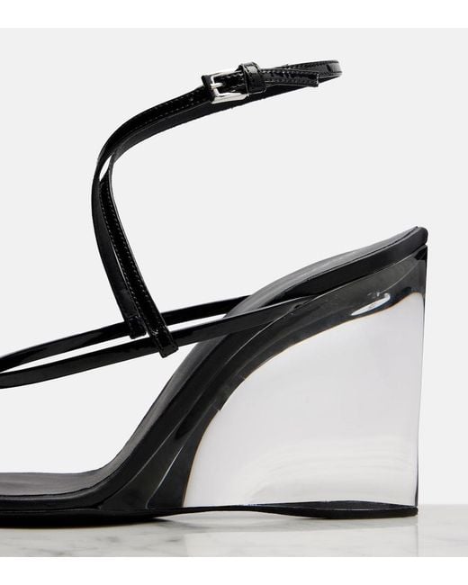 Alaïa Black Patent Leather Wedge Thong Sandals