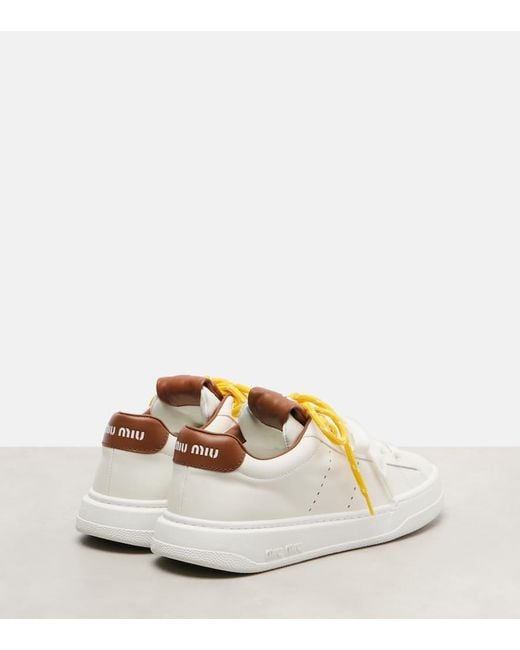 Baskets En Cuir A Logo Miu Miu en coloris Metallic
