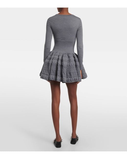 Robe en laine melangee Alaïa en coloris Gray