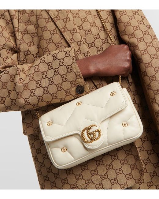 Gucci Natural Schultertasche GG Marmont Mini aus Leder