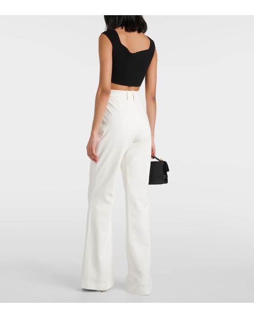 Pantalones Flared De Crepe Con Tiro Alto Balmain de color White