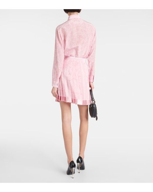 Minifalda Barocco de seda plisada Versace de color Pink
