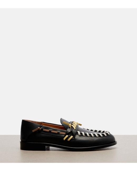 Tod's Black Leather Loafers