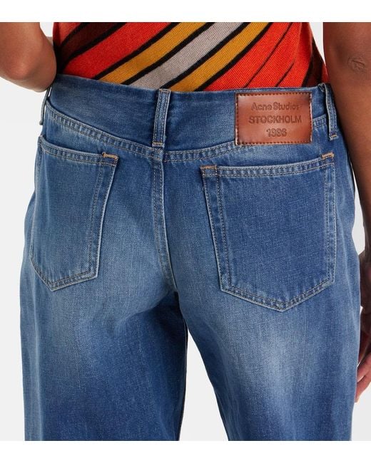 Jeans A Gamba Larga E Vita Bassa di Acne in Blue
