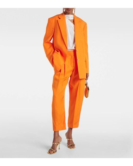 Pantalones cropped Iconic de tiro alto Stella McCartney de color Orange