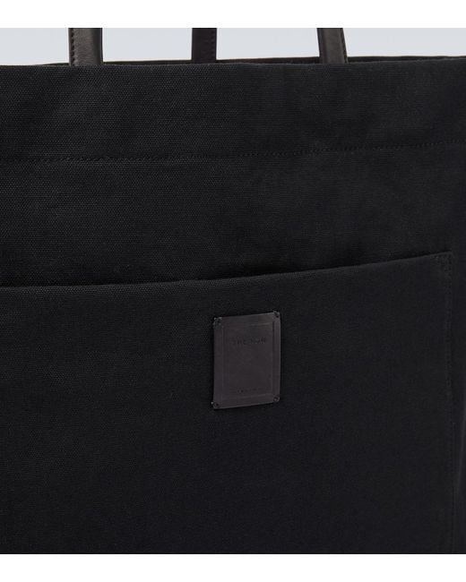 The Row Black Tori Leather-Trimmed Canvas Tote Bag for men