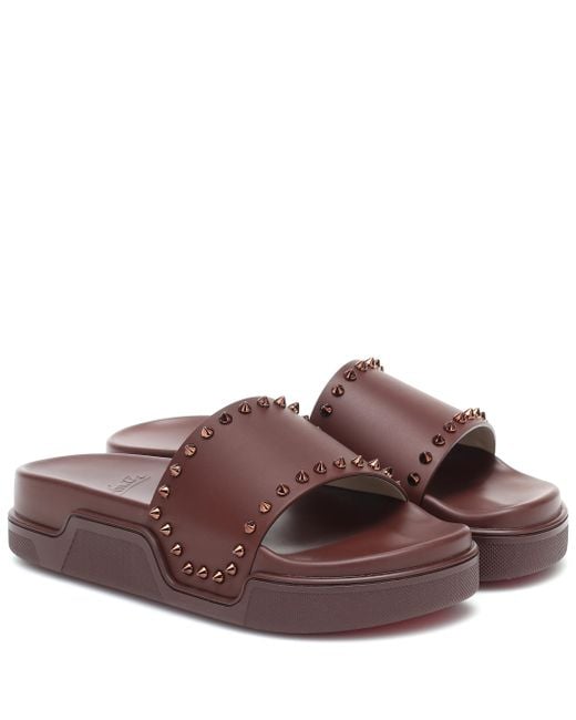 christian louboutin studded slides