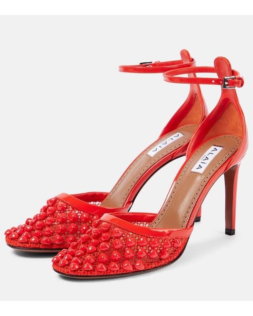 Salones De Piel Y Malla Con Tachuelas Alaïa de color Red