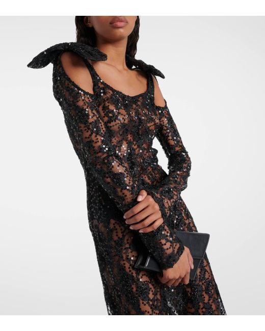 Robe longue en dentelle Nina Ricci en coloris Black