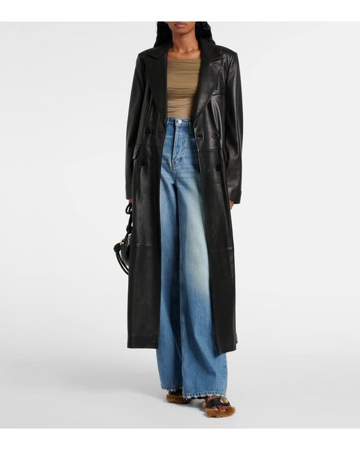 Mules Turnlock Con Shearling di Christopher Esber in Natural