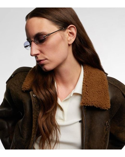 Miu Miu Blue Logo Oval Sunglasses