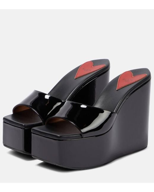 Alaïa Black Patent Leather Platform Wedge Mules