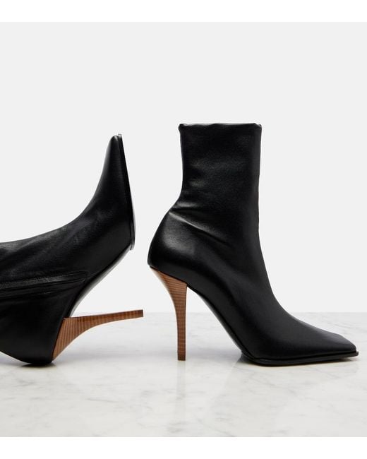 Alaïa Black Leather Ankle Boots