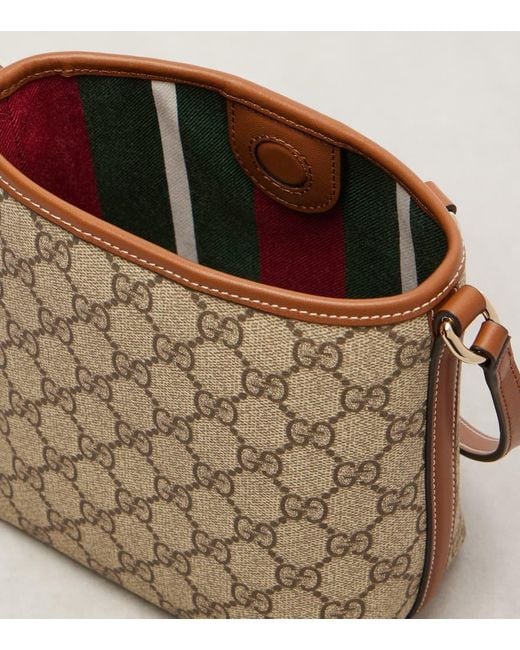 Gucci Metallic Gg Emblem Small Bucket Bag