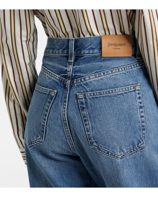 Jeans A Gamba Larga V-Waist di Saint Laurent in Blue