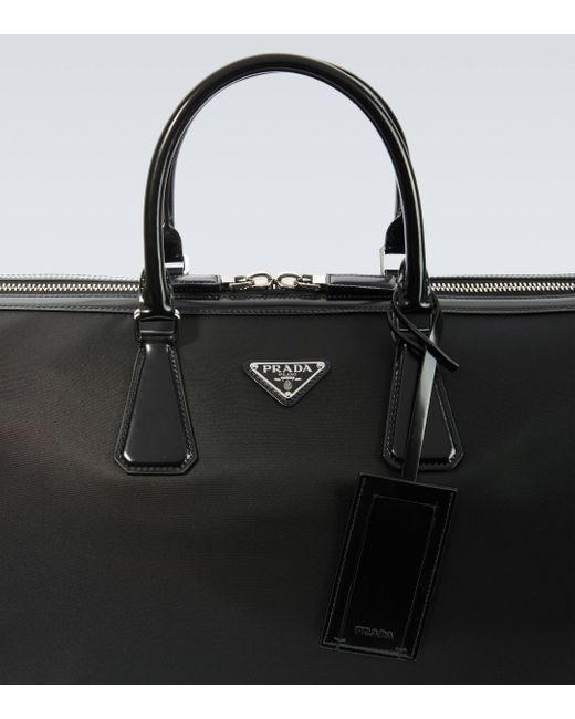 Prada Black Leather-trimmed Duffel Bag for men