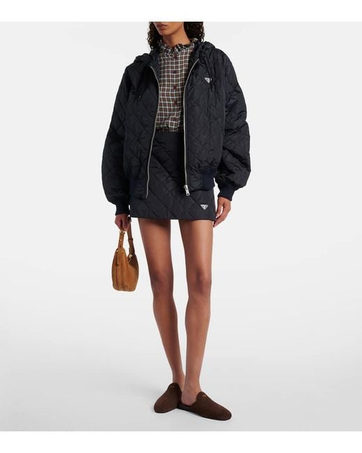 Mini-Jupe Matelassee En Re-Nylon Prada en coloris Blue